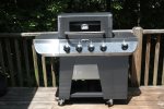 Gas grill with spare tank